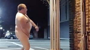 Ugly beamy guy jerking off in the street