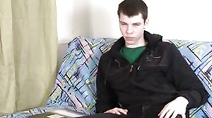 Lad is posing in front of web cam