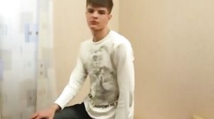Thin runt takes off his trousers
