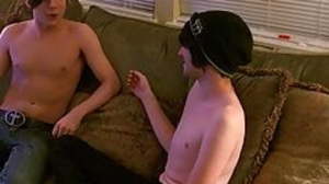 Young men kiss before performing sloppy oral and