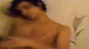 Horny young bloke plays with his cock and cums in