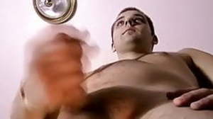 Twink plays with his big dick solo coupled with