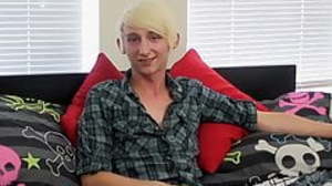 Petite emo with X-rated tattoos strokes himself