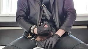 Young leather twink wanking and cumming over cum