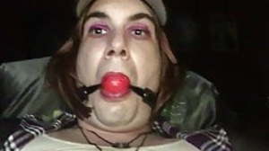 Dolled up, dressed up, gagged, with 10 inches in