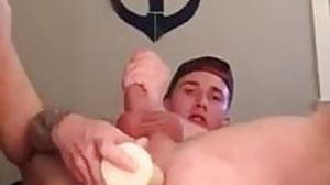 horny tattooed boy screwing dildo and cumshot