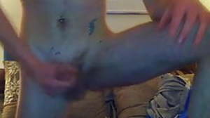 Inked twink fingering his juicy ass and jerking
