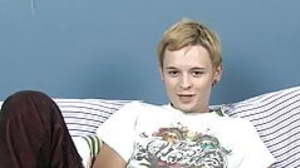 Inked twink Miles jerking off and wadding dildo in