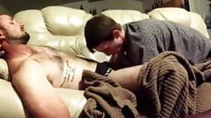 boy gives daddy a blow job