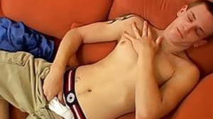 Tattooed twink Tomy solo stretching his monumental