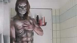 Showering off halloween makeup.