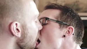 Tattooed bearded hunk fucking young twink bareback