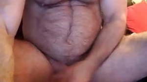 mature muscle bear blows stacks on his belly