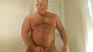 mature bull jerking withdraw and playing with his