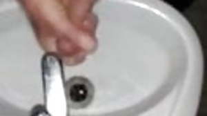 Jerking in the bathroom