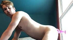 Slutty Tyler Riding Dildo On Window!
