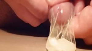 Retard jerking until cum in Condom