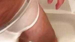 Pissing on   dad, in white briefs