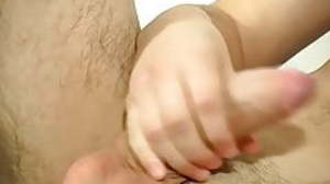 Simmering UK twink strokes his massive cock in a