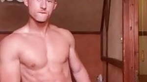 Russian athletic boy posing in his room