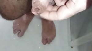 Pissing upstairs my toes in the shower