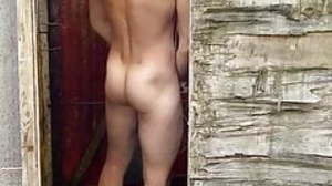 Young Hot Fit Guy in Shower Outdoor