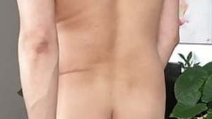 Muscular asian blissful man showing off his body