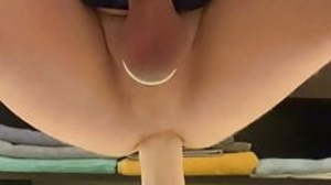 Boy playing with big dildo
