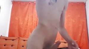 Inked twink jerks off solo for a popping cumshot