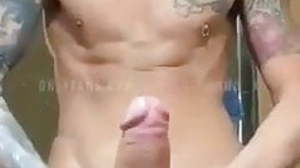 Handsome guy with a huge big cock jerks off in an