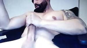 Bearded hot muscle guy verge upon his big cock