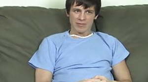 Cute little twink Adrian Scott jerks off during an