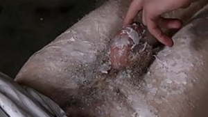 Restrained young twink receives wax tormenting