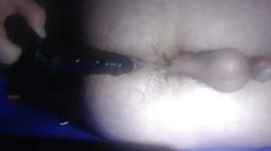 Fucking my ass with jet-black dildo